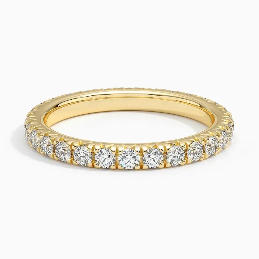 Vigselring i rödguld med diamanter