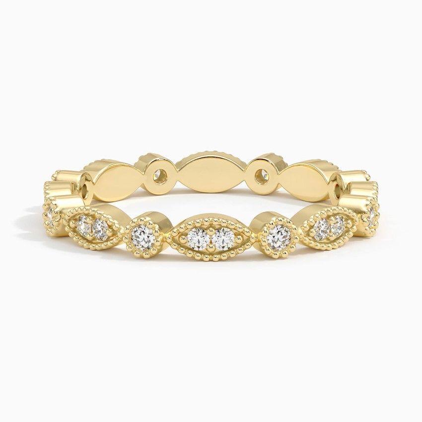 Vigselring i rödguld med diamanter