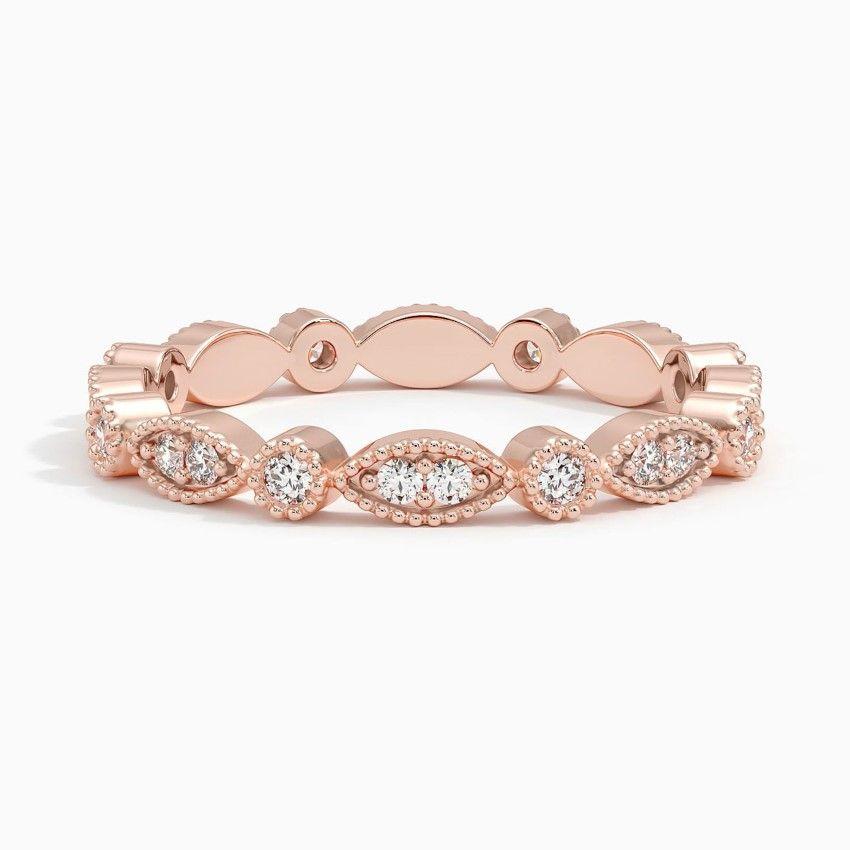 Vigselring i roséguld med diamanter