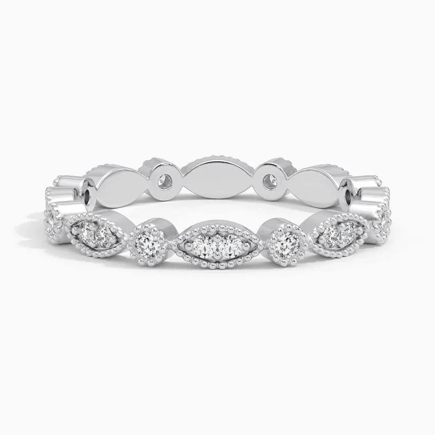 Vigselring i vitguld med diamanter