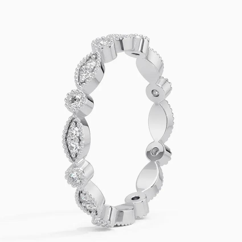 Vigselring i vitguld med diamanter