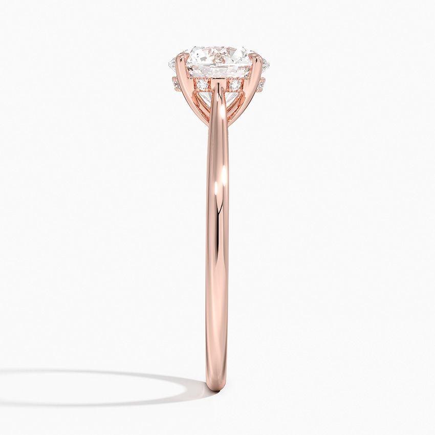 Förlovningsring i roséguld med dolt halo