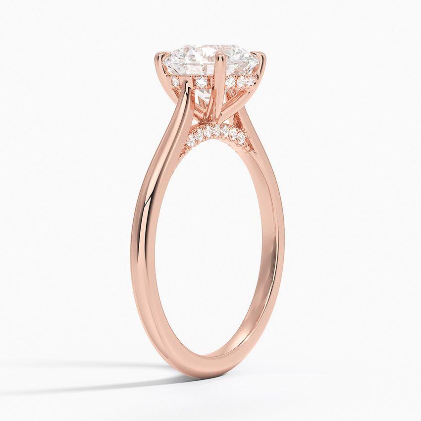 Förlovningsring i roséguld med dolt halo