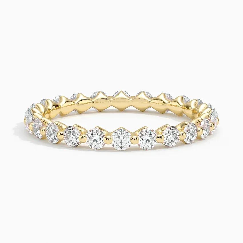 Vigselring i rödguld med diamanter