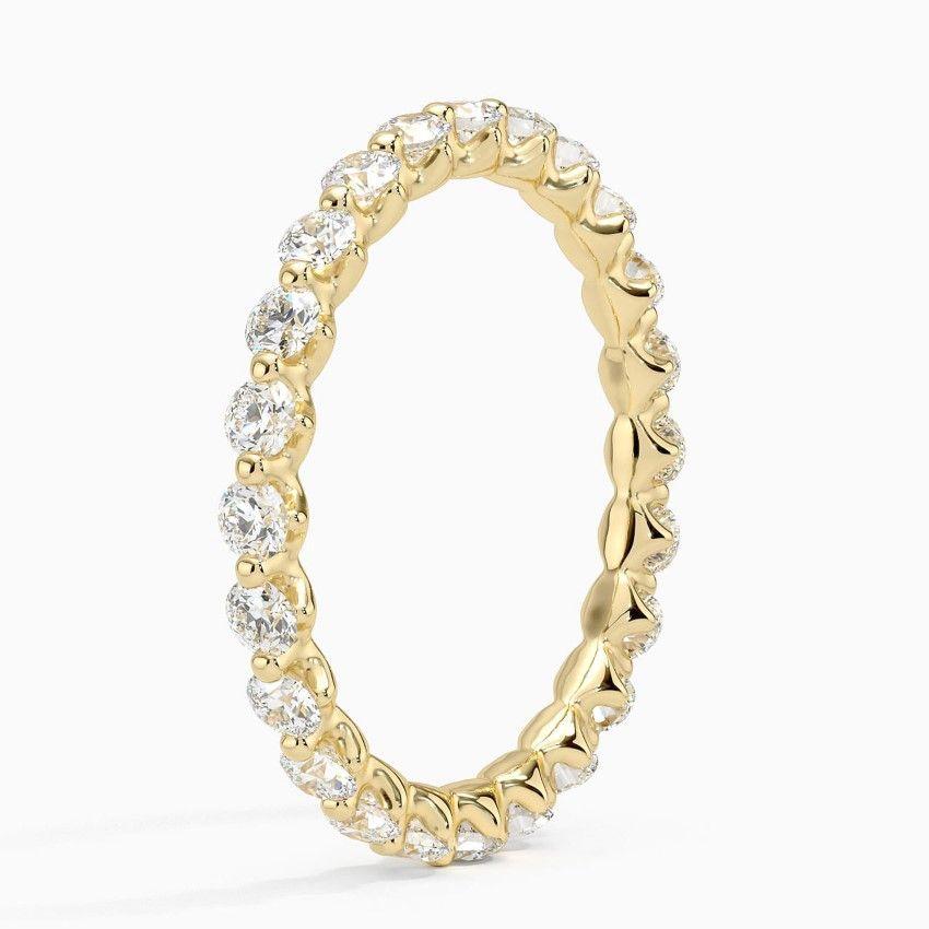 Vigselring i rödguld med diamanter