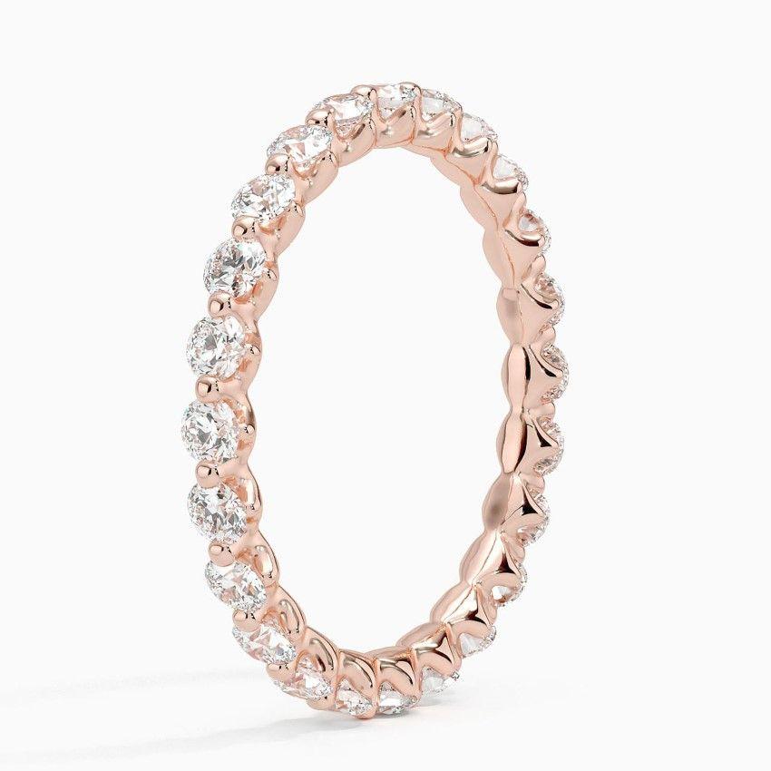 Vigselring i roséguld med diamanter