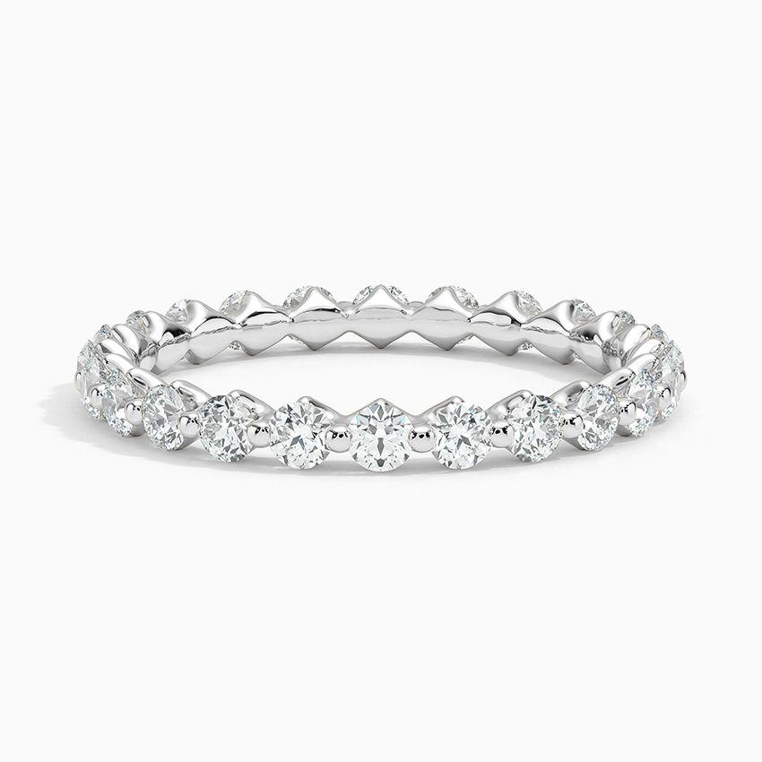 Vigselring i vitguld med diamanter