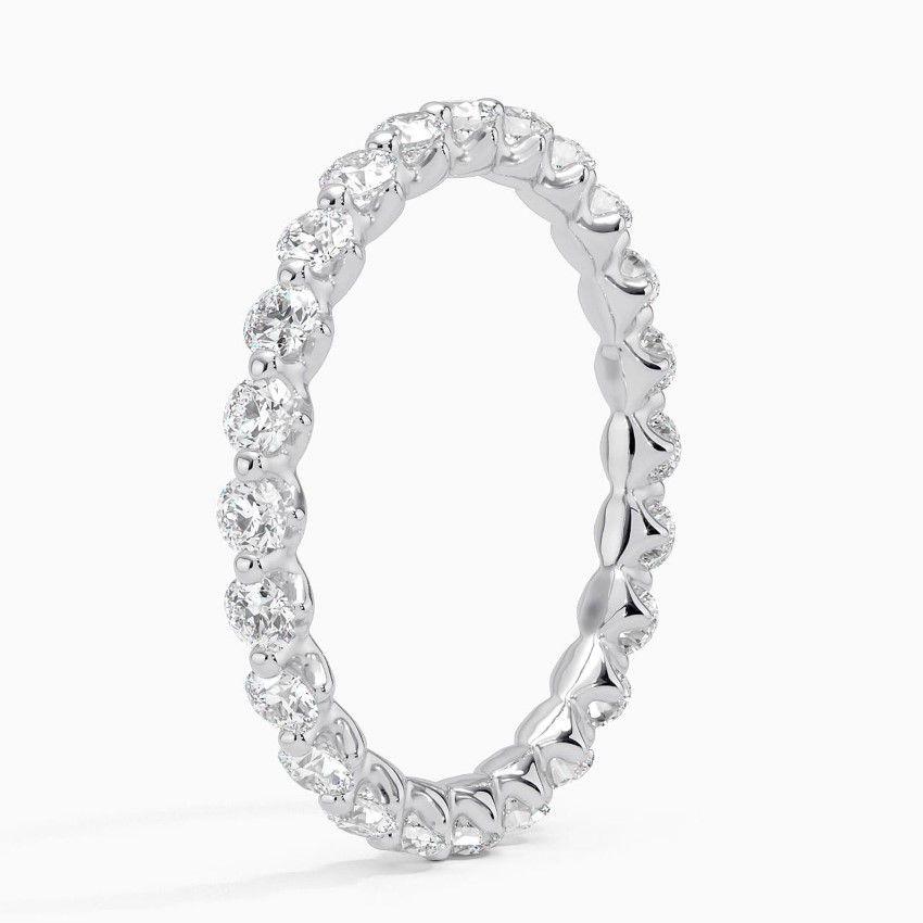 Vigselring i vitguld med diamanter