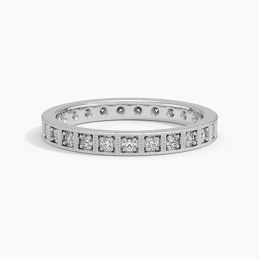 Vigselring i vitguld med diamanter